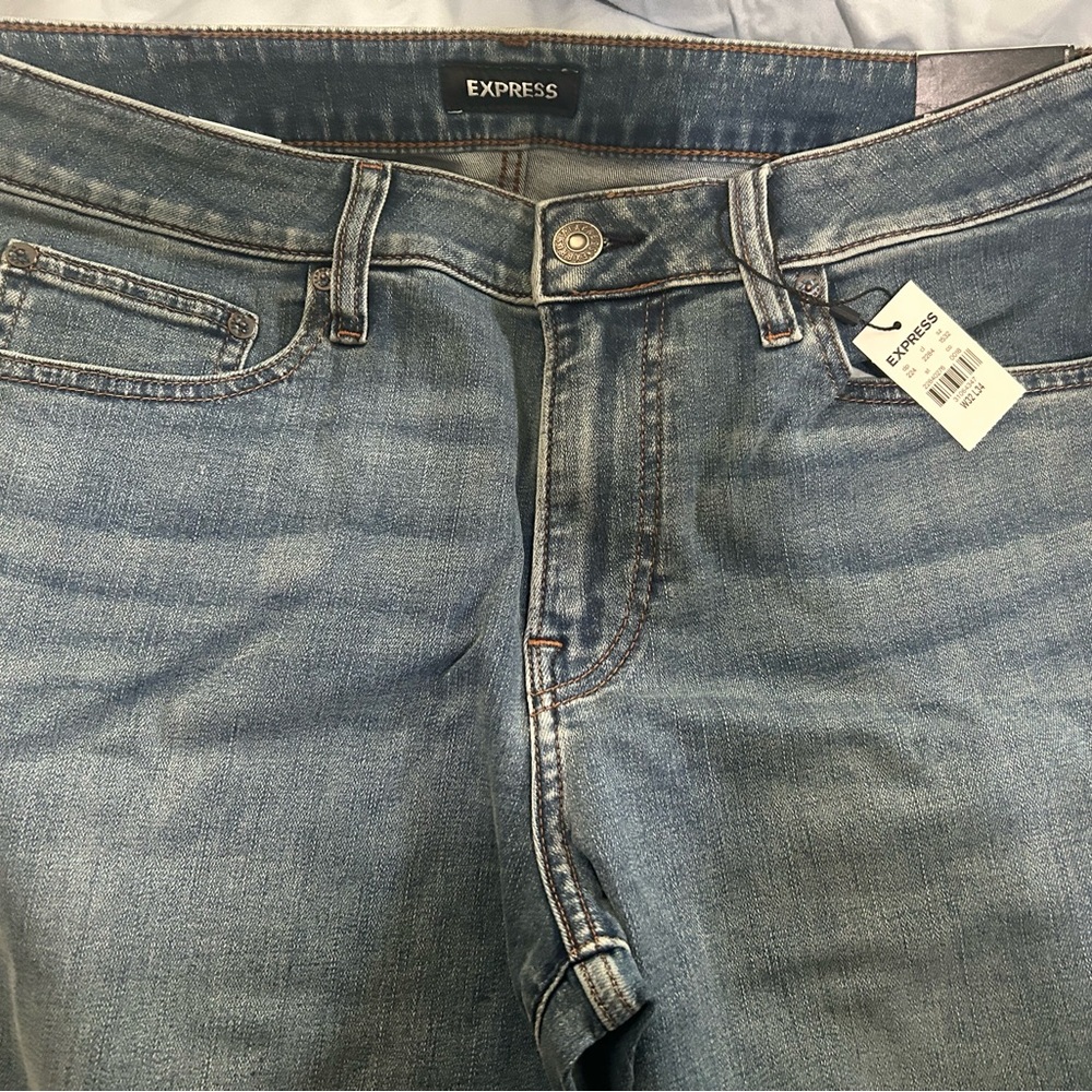 Brand new men’s 32x34 slim straight express jeans. NWT.